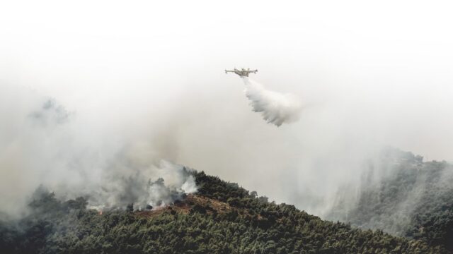 Picture of water bomber putting out wildfire