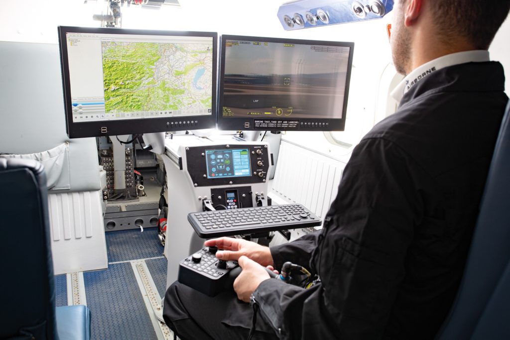 Operator sitting in ABT miss ionized viking twin otter using AIMS-ISR