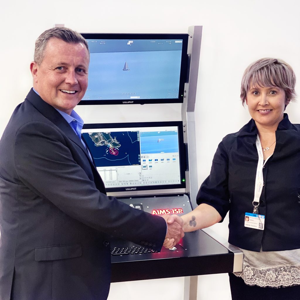 CarteNav and Smith Myers announce the integration of ARTEMIS with the AIMS-ISR Mission Management System. Seen from left to right is Andrew Munro, Director of Smith Myers and Deirdre Gallant, Vice President of Business Development of CarteNav. 